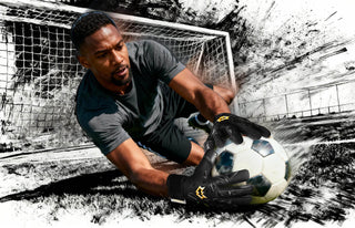 Goalkeeper wearing black gloves with gold accents, catching soccer ball near goal net